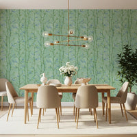 Bamboo Breeze Minty Teal Wallpaper behind a dining set with hanging lights