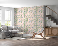 Bamboo Breeze Rose Wallpaper behind a low sofa in a warm neutral sitting area, GD8934