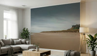 Authentic Bamburgh Castle wallpaper wide sandy shore northern England view.