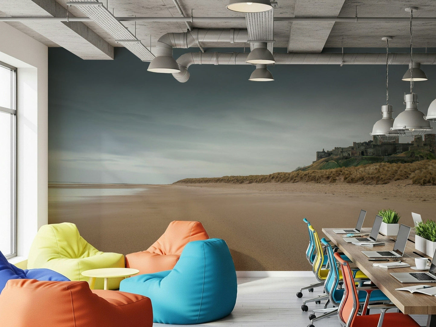 Bamburgh Castle wallpaper for walls featuring sandy beach and dramatic sky.