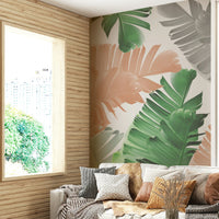 Banana leaf wallpaper creating a jungle play corner

