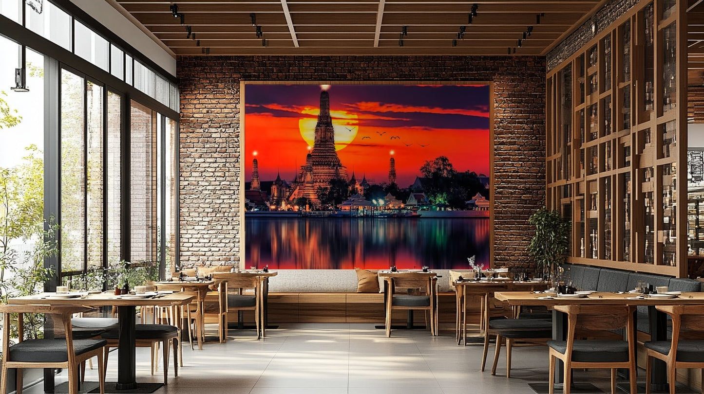 Red sky over a majestic Bangkok temple near the water. GD5066