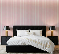 Bedroom styled with Barely Blush Stripes Wallpaper and soft vertical pattern