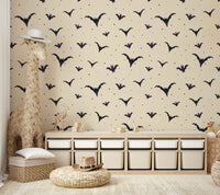 Detailed view of the abstract, hand-drawn bats

