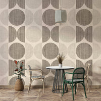 An artistic midcentury pattern mural on minimalist wallpaper.

