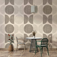 An artistic midcentury pattern mural on minimalist wallpaper.

