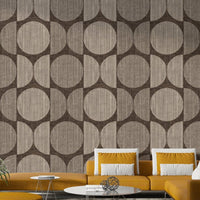 A graceful subtle circle wall mural in cool, earthy tones.

