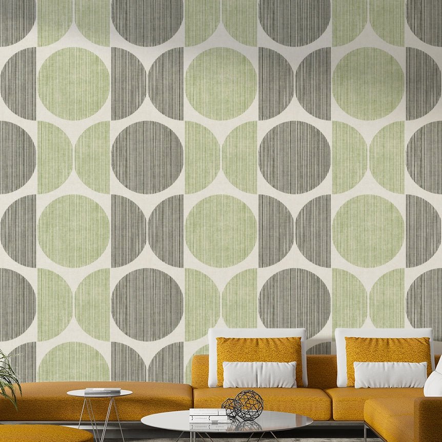 A graceful subtle circle wall mural in cool, sage tones.

