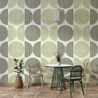 An artistic minimalist pattern mural on geometric wallpaper.

