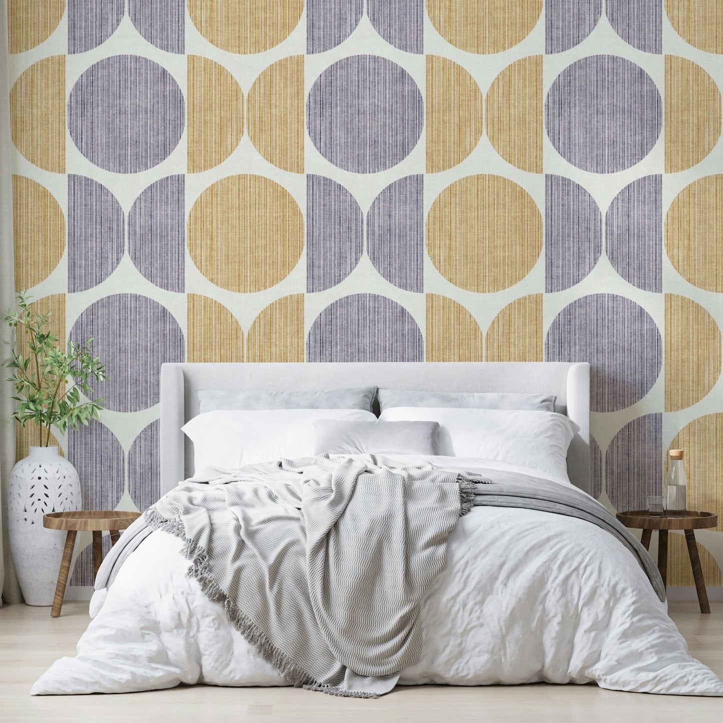 A graceful subtle circle wall mural in cool, neutral tones.

