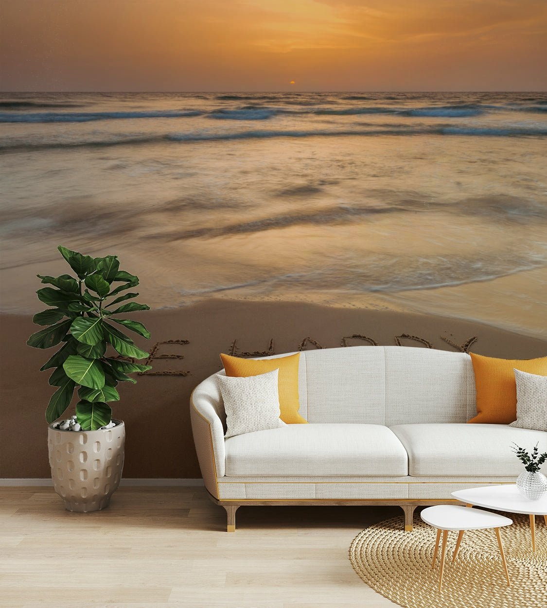 Be Happy beach mural with message in sand

