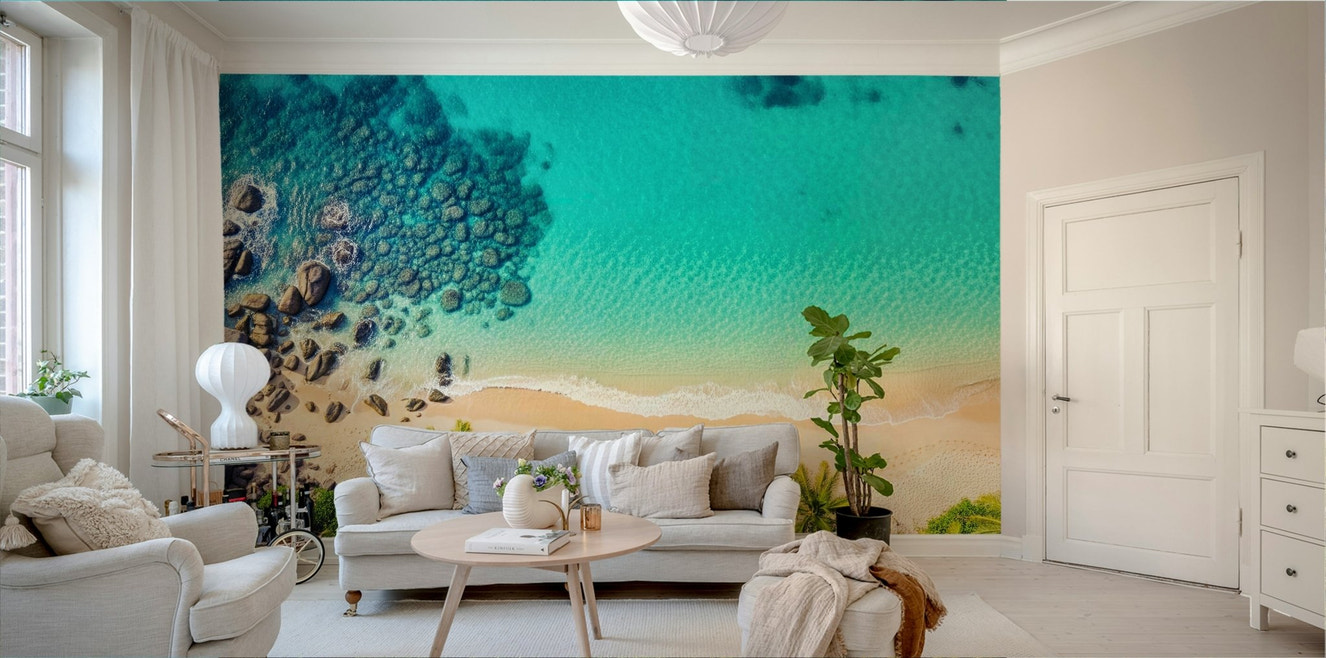 A full-wall mural of a serene beach landscape.
