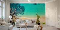 A full-wall mural of a serene beach landscape.
