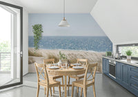 A peaceful open country mural on decorative wallpaper.