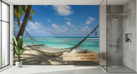 Beach Hammock Haven wall mural in a sunlit guest suite with white linen., GD7811