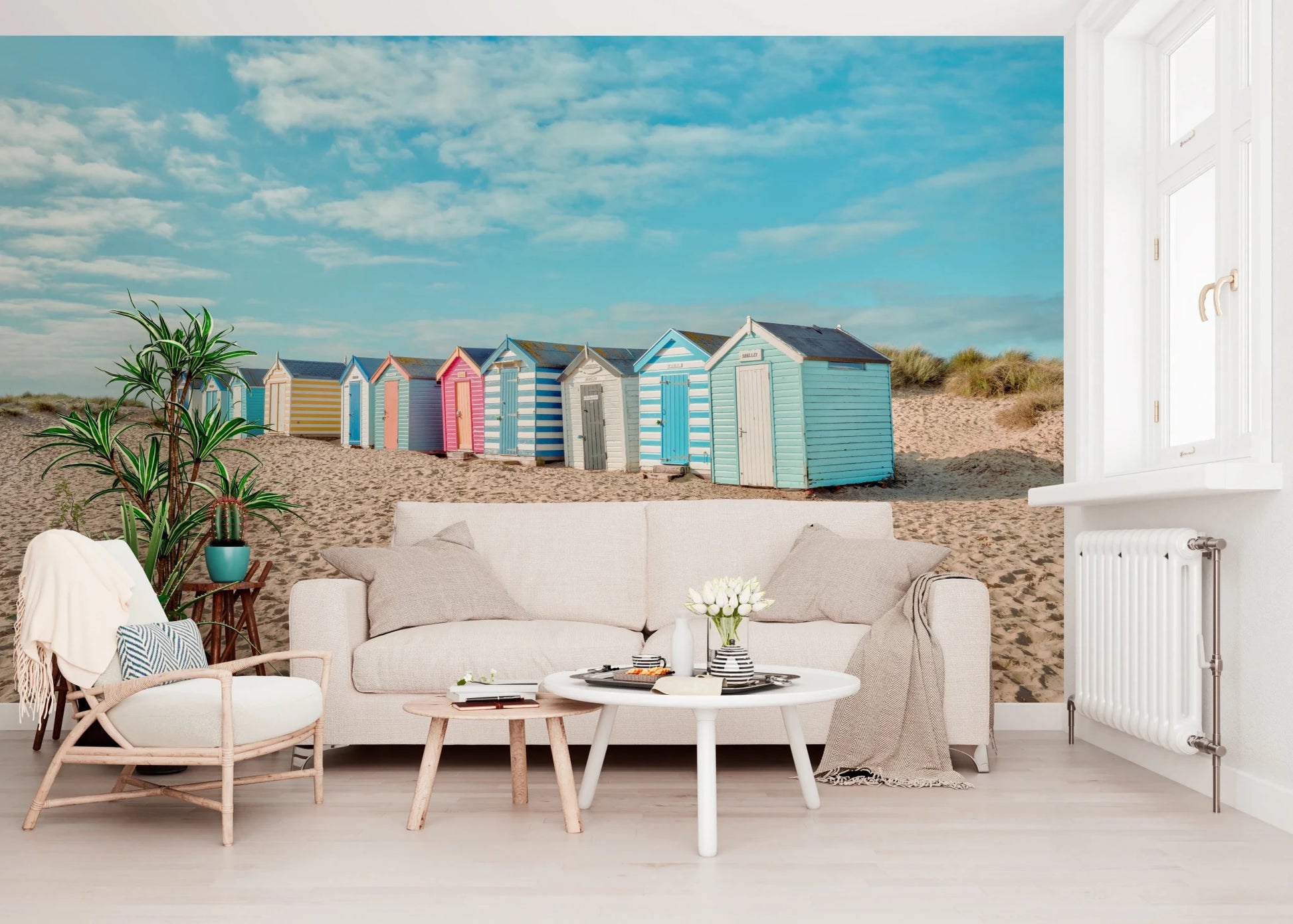 A sunlit Living corner framed by Beach Huts on the Shore Wall Mural and soft dunes, GD8871