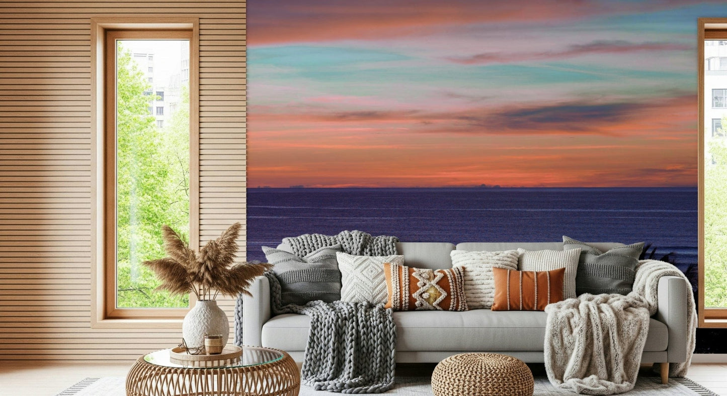 Scenic shore wallpaper with orange and pink tones for a guest room wall mural.