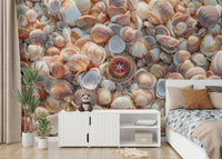 Vintage beach treasures mural with natural elements.

