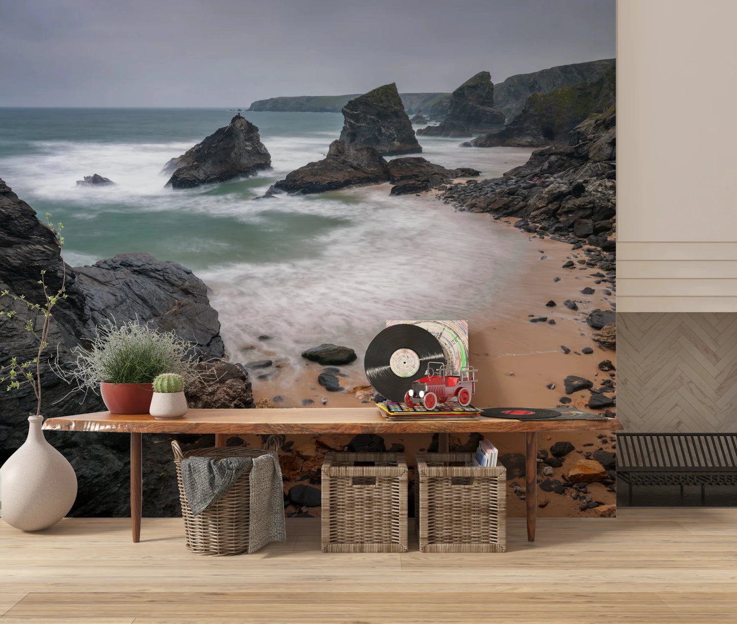 Minimal interior lifted by coastal mural showing waves washing rocky shore, GD8237