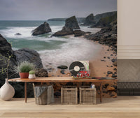 Minimal interior lifted by coastal mural showing waves washing rocky shore, GD8237