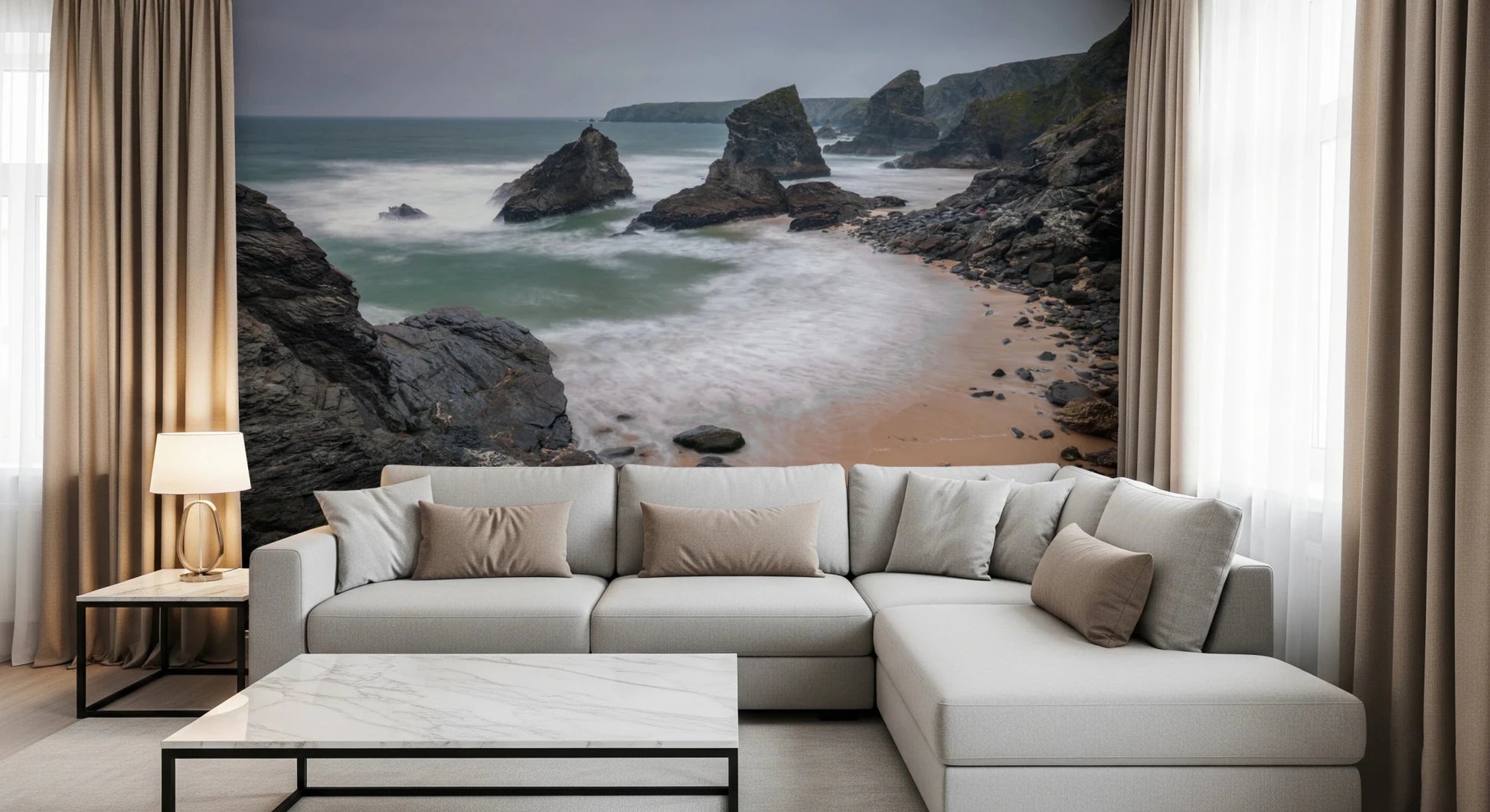 A modern sofa setup highlights rugged coastline mural with flowing sea detail, GD8237