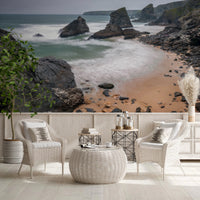 Cozy seating setup blends with ocean cliff mural and earthy sand textures, GD8237