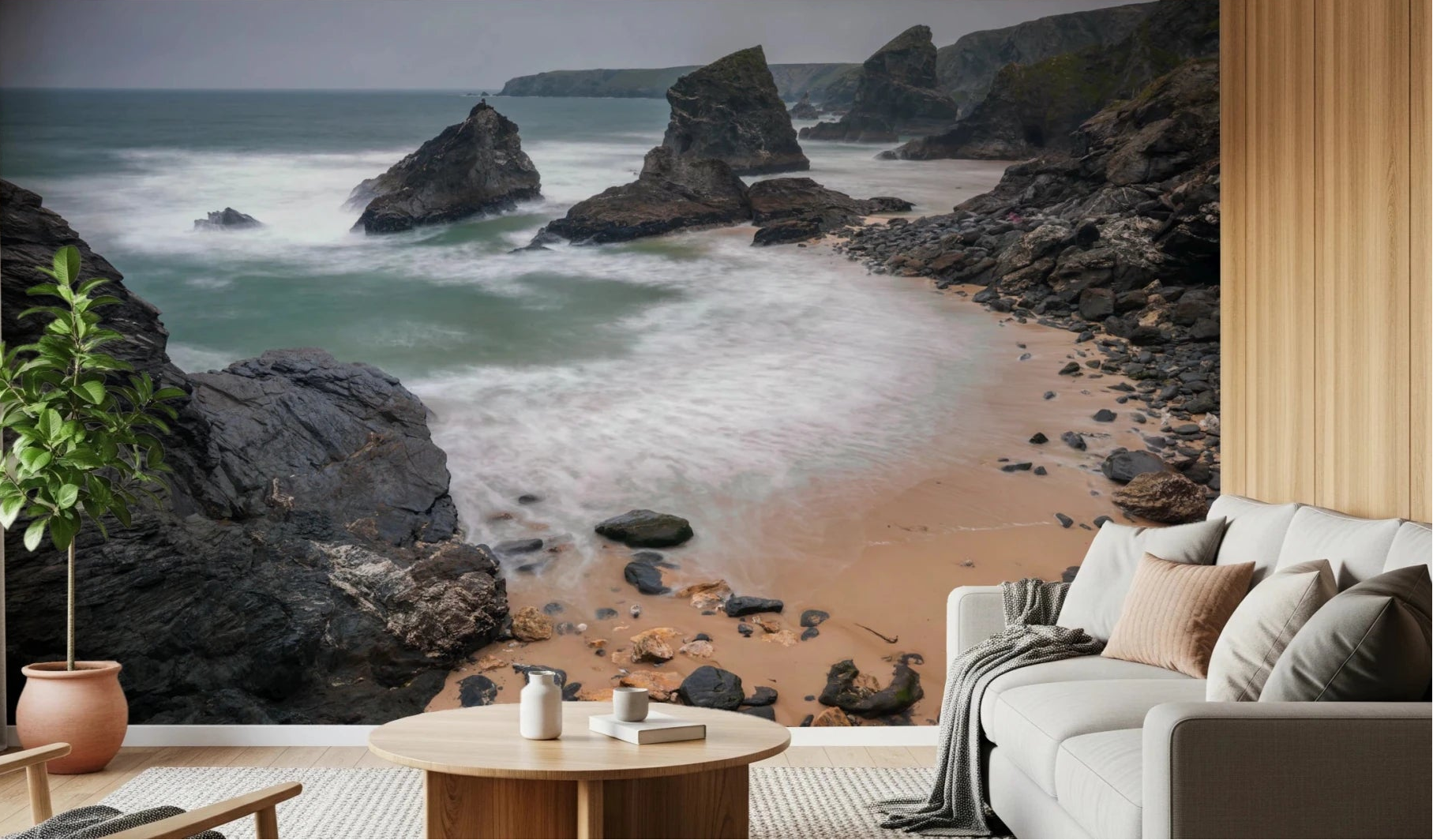 Coastal rock shoreline mural brings soft ocean movement into this neutral living room, GD8237