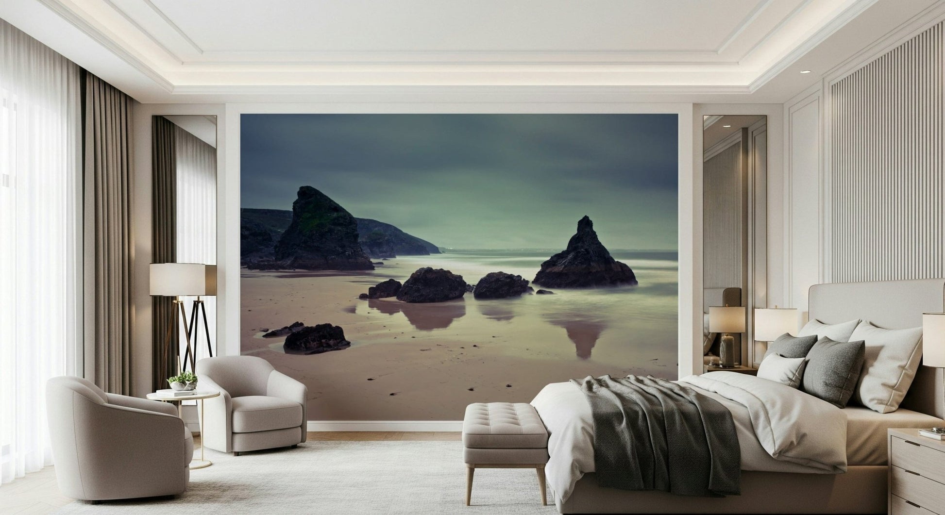 Wall mural Bedruthan Steps Beach rugged rocks and smooth water surface.