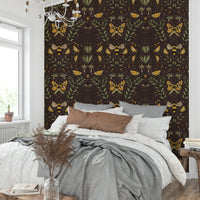Wallpaper with various floral and animal motifs.

