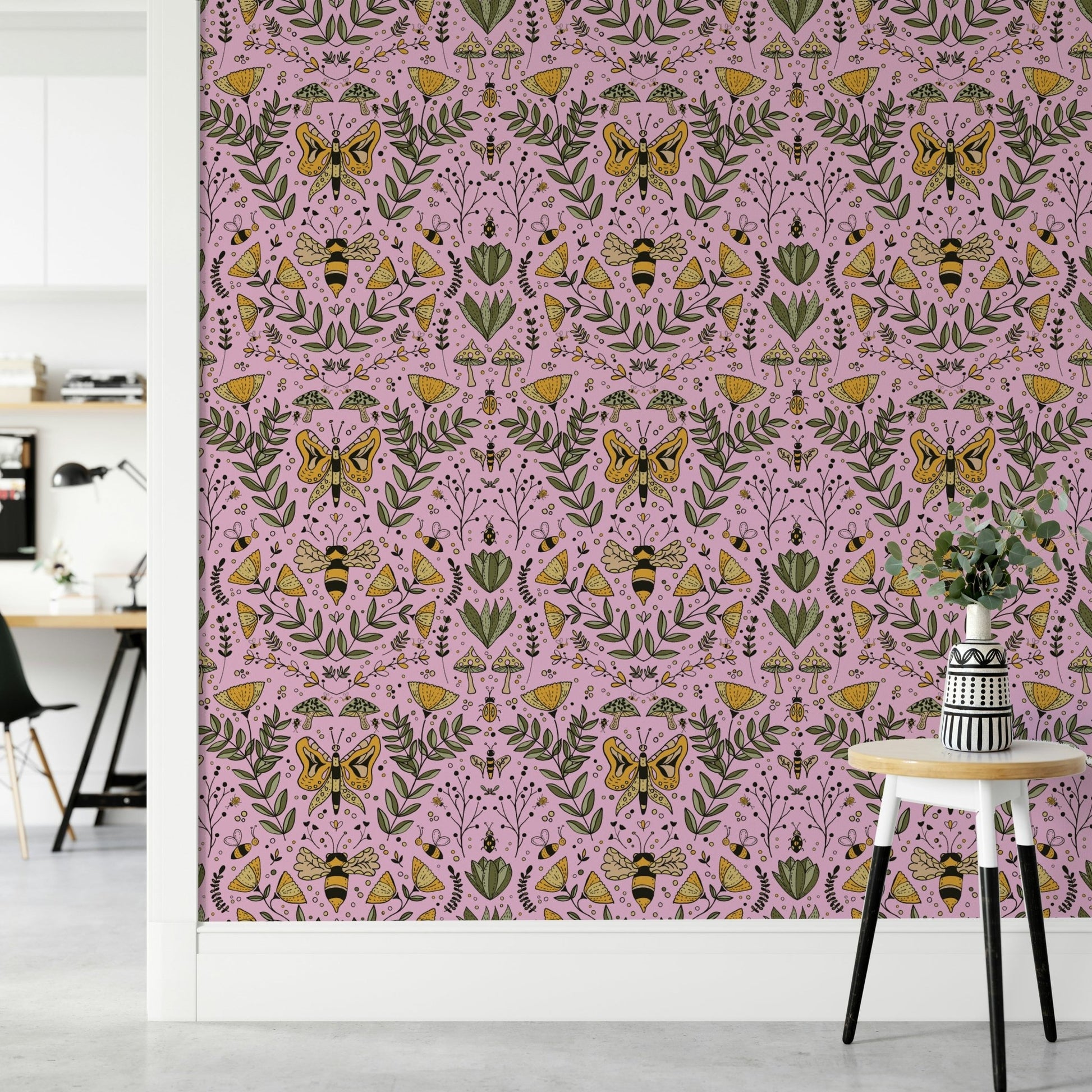 Design featuring hand-drawn insects and mushrooms on a pink background.

