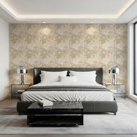 Botanical Embrace Monstera Foliage Wallpaper behind a dark upholstered bedroom, GD8944
