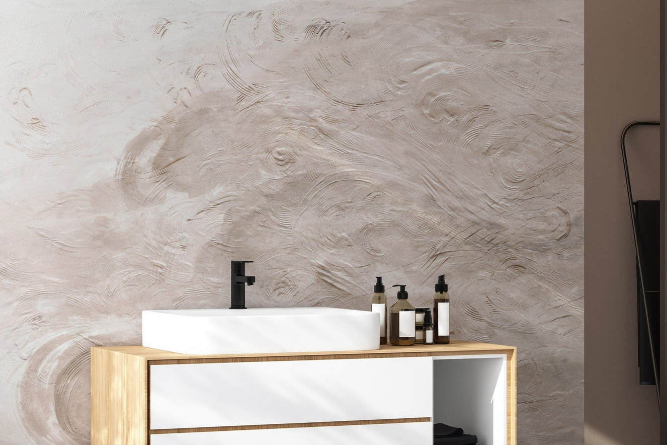 Beige textured swirl wallpaper design
