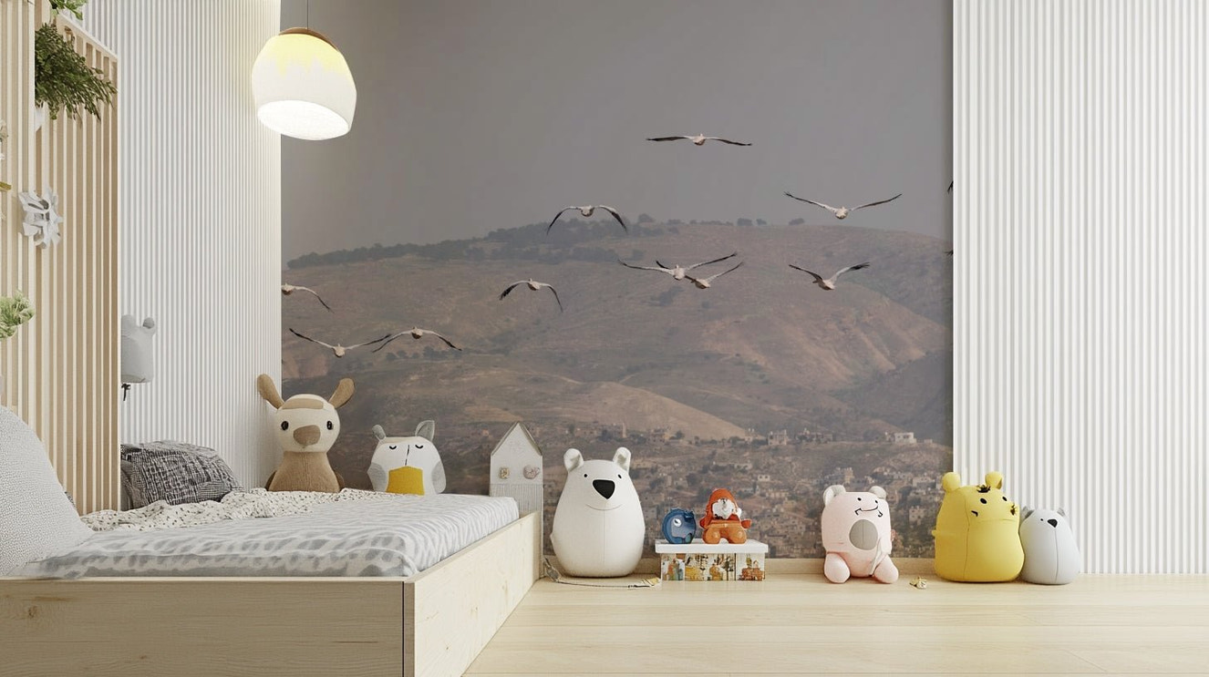 Features a landscape of rolling hills or mountains, reminiscent of ancient or biblical settings.
