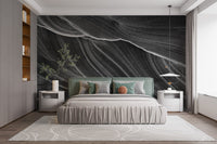 Minimalist wavy marble mural in grayscale
