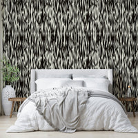 Dramatic black waves mural.
