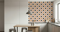 Perplexing Block Party Wallpaper in ashen pink and burnt orange.