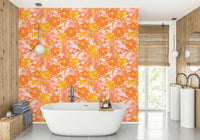 An angled shot of a wall with blurred flower wallpaper

