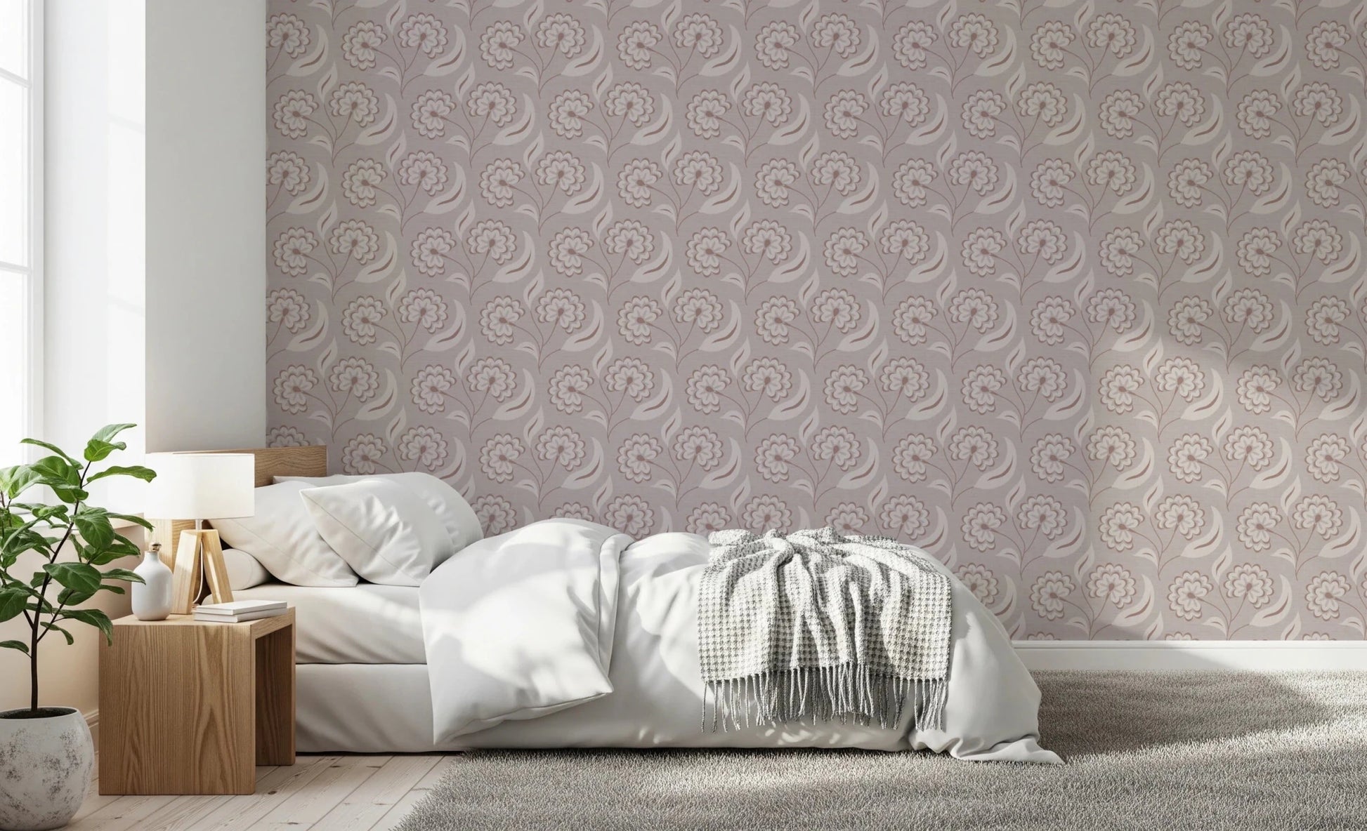 Bedroom scene where Bloomscape Beige Wallpaper sits behind a neatly arranged bed