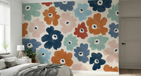 A graceful subtle flower wall mural in bright, elegant tones.