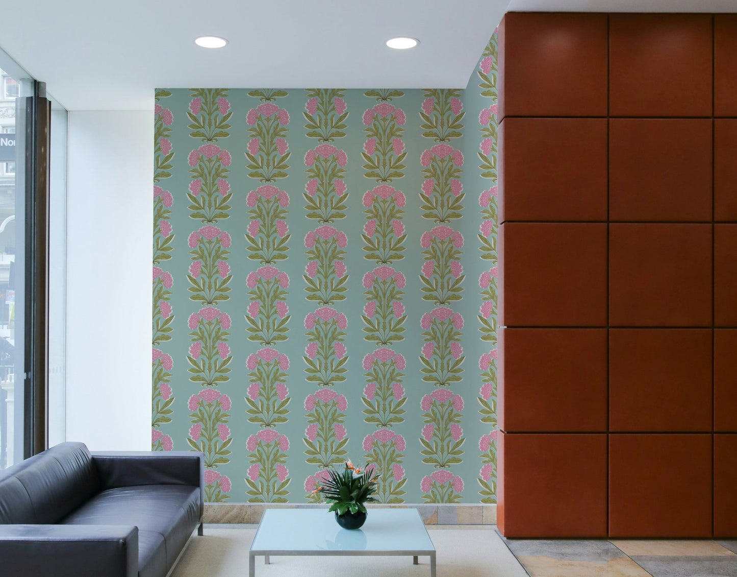 The colors are soft, muted tones of beige, green, and pink.

