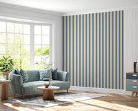 Sunlit lounge styled with Blue and Yellow Candy Stripes Wallpaper in soft stripe bands