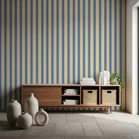 Blue and Yellow Candy Stripes Wallpaper behind shelves in a relaxed sitting area