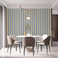 Round dining setup paired with Blue and Yellow Candy Stripes Wallpaper