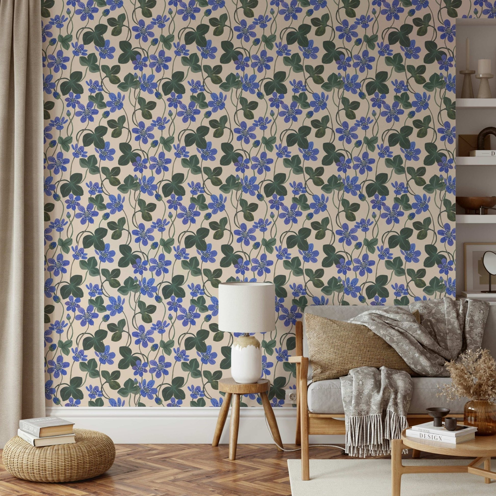 Blue anemone floral pattern on white wallpaper

