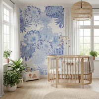 Contemporary floral wall mural with cool-toned blossoms and light background
