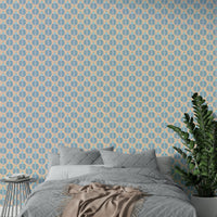 Bedroom accent wall with blue plant design

