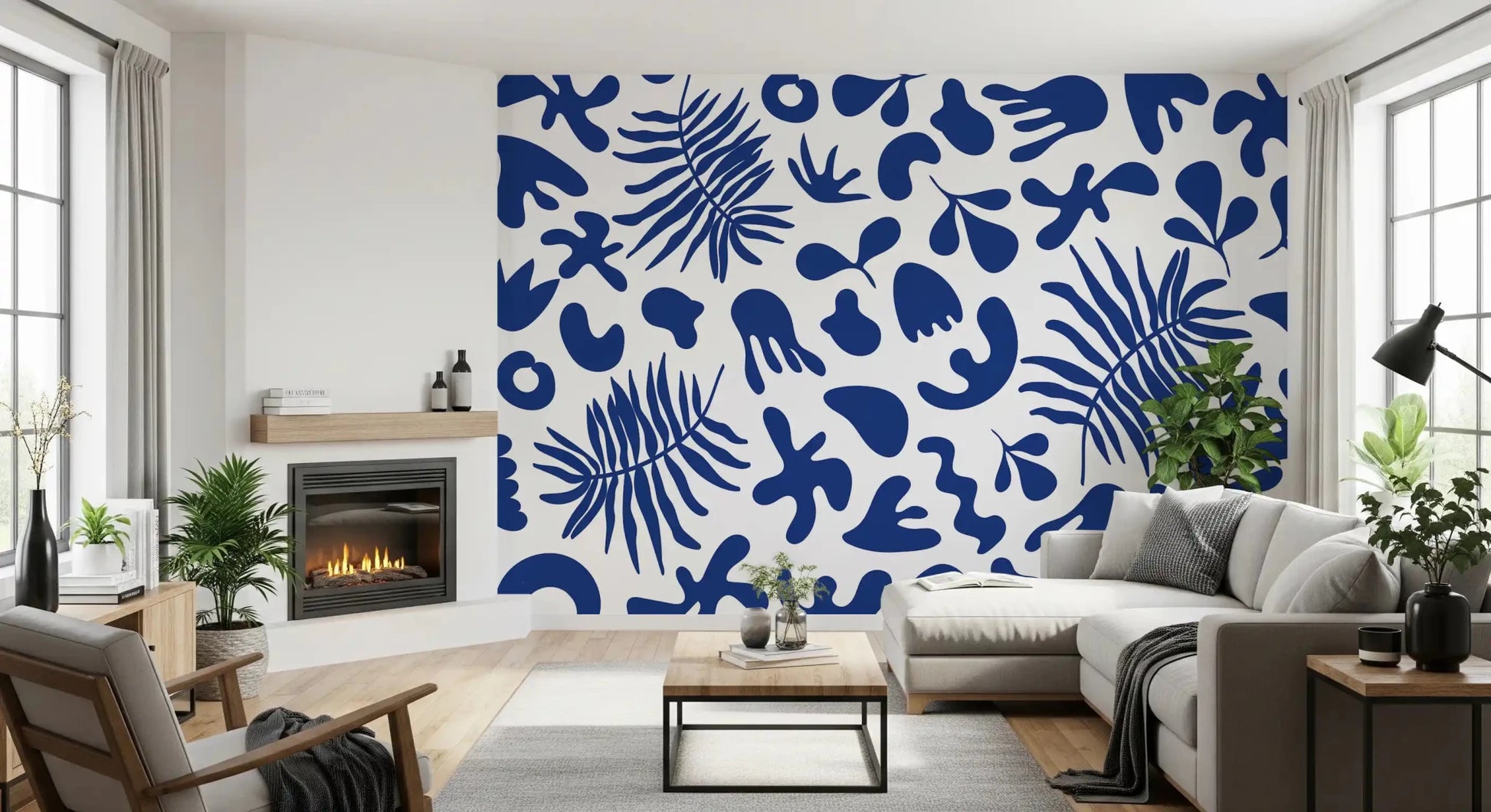 Living room styled with Blue Clipped Garden wall mural and cobalt leaf forms