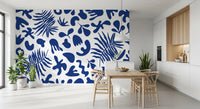 Abstract blue clipped garden wall mural with palm lines and soft curves