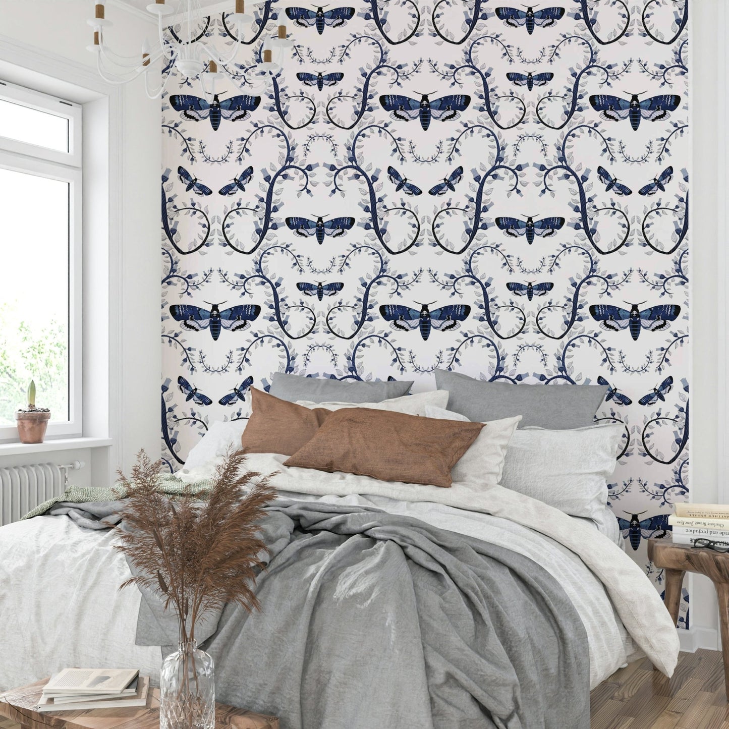 Elegant dark wallpaper featuring moths in a blue forest tangle.

