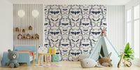 Artistic wallpaper with hand-drawn moths and blue vine detailing.

